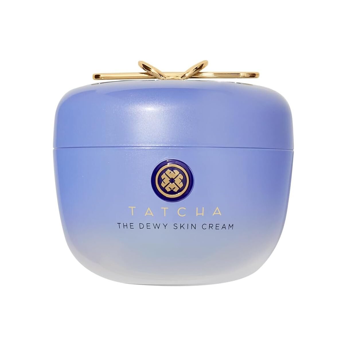 A beautiful pastel purple jar of Tatcha The Dewy Skin Cream with a gold scoop, highlighting clean Japanese luxury skincare products.